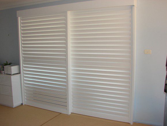 Traditional and Convenient Bi Pass Shutters | The Shutter Guy
