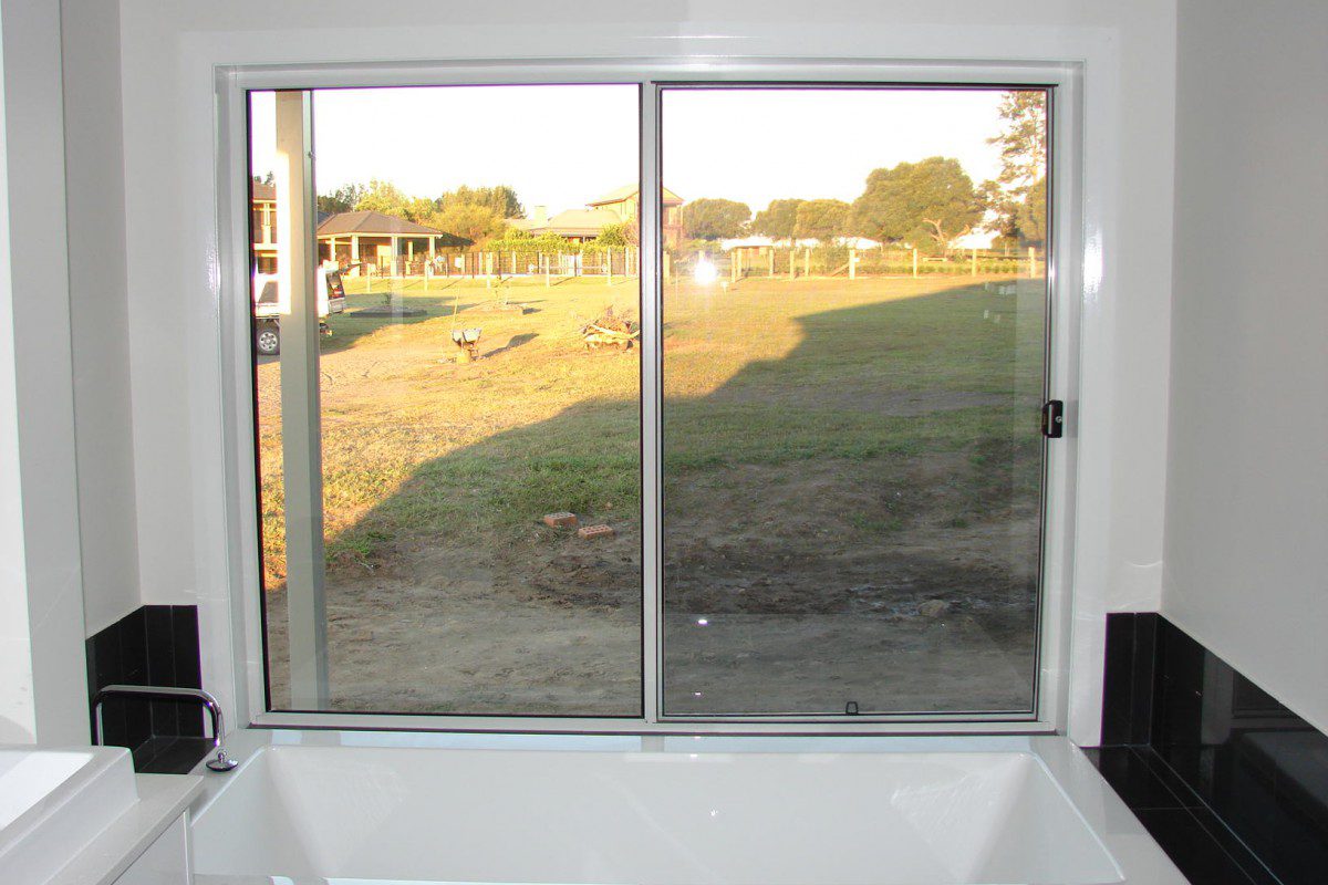 custom made shutters for a raised bath window - DSC05529