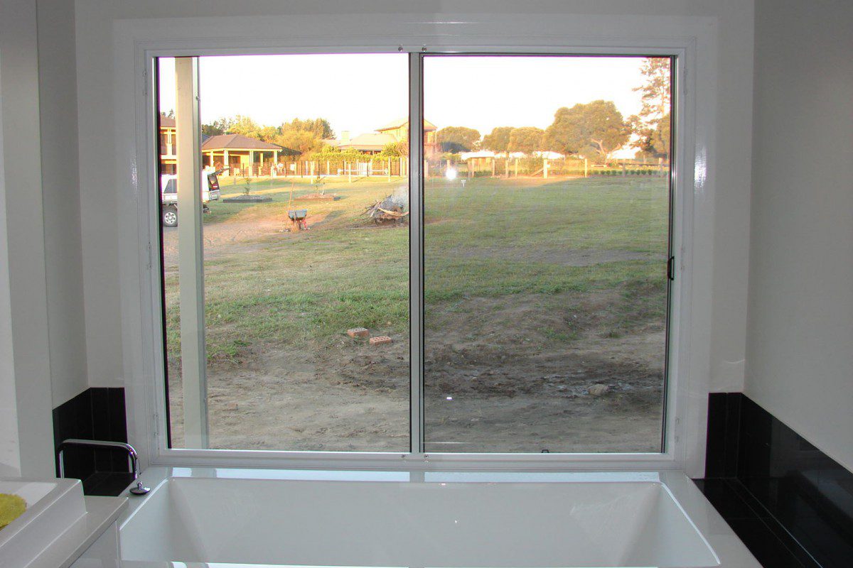 custom made shutters for a raised bath window - DSC05530