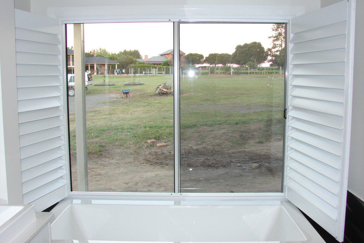 custom made shutters for a raised bath window - DSC05534