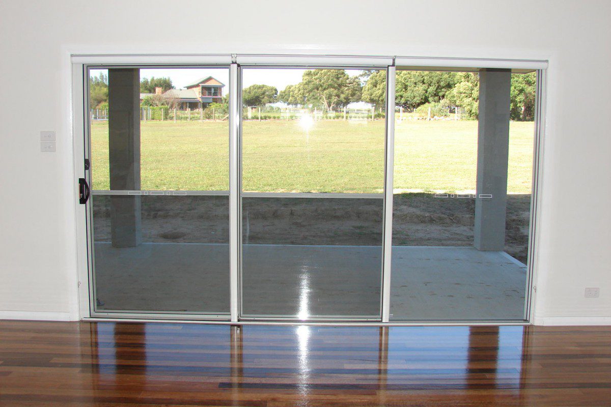 triple roller blinds for glass sliding doors - 01
